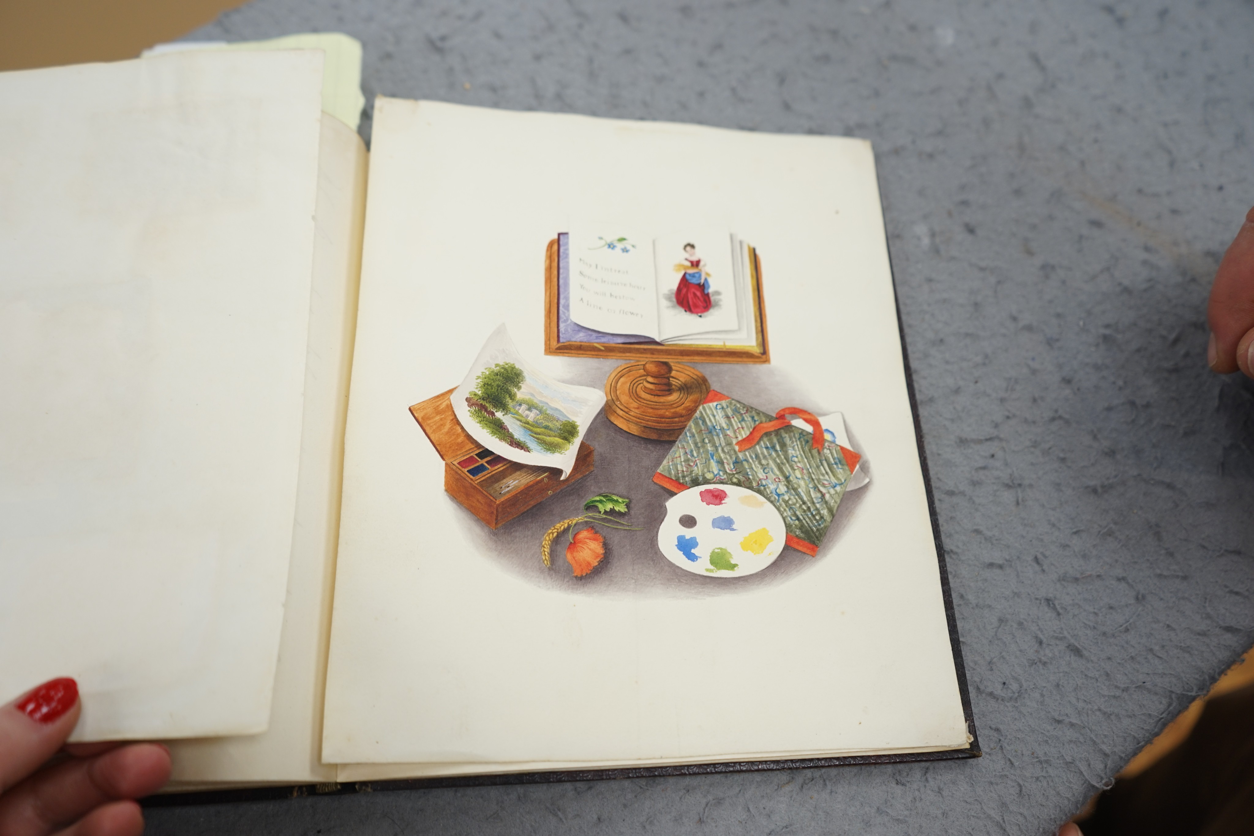 An early 19th century hand written journal, sketch book with scraps, coloured engravings, etc.